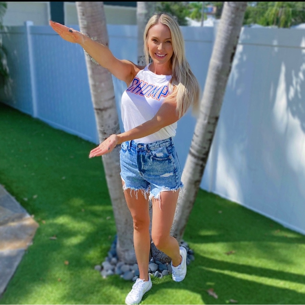 “CHOMP” tank. This is a NWT top from my boutique. Will not lower price much.